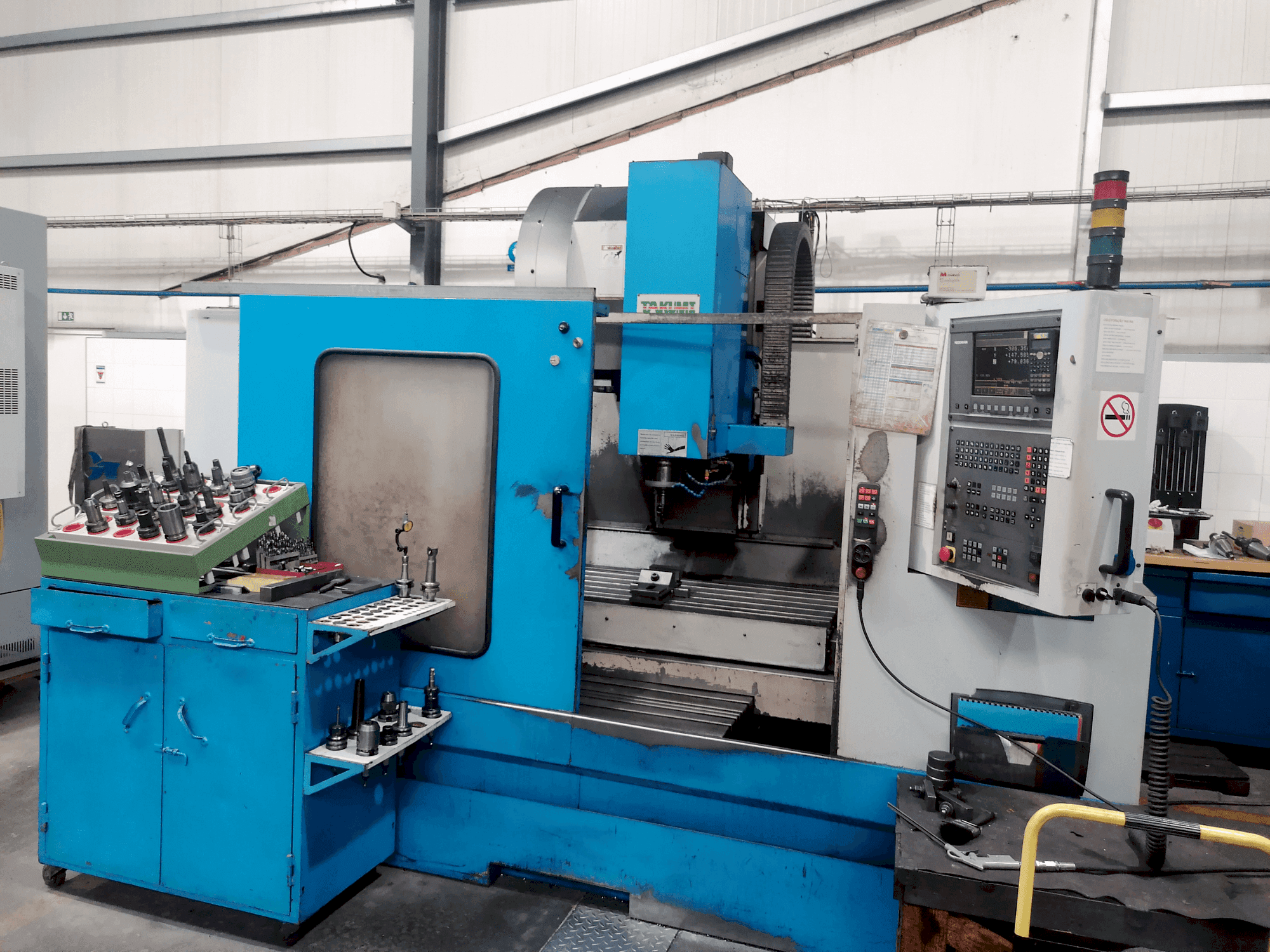 Čelní pohled na Takumi V11 stroj