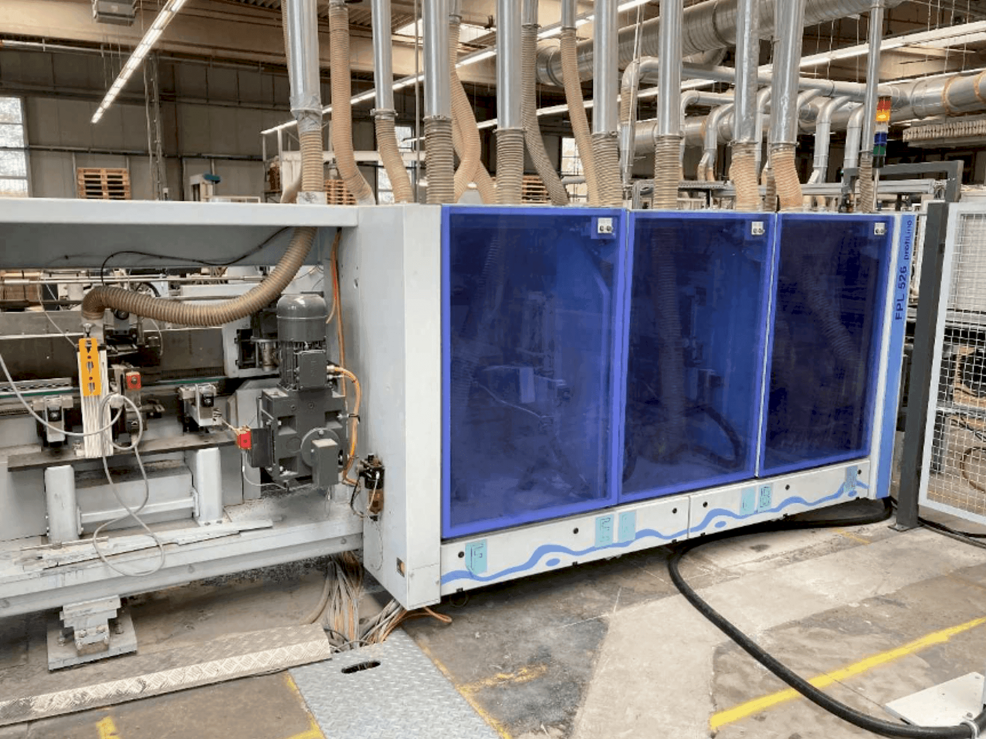 Čelní pohled na HOMAG PROFI FPL 525/6/04/PW/V LVT Profiling System stroj