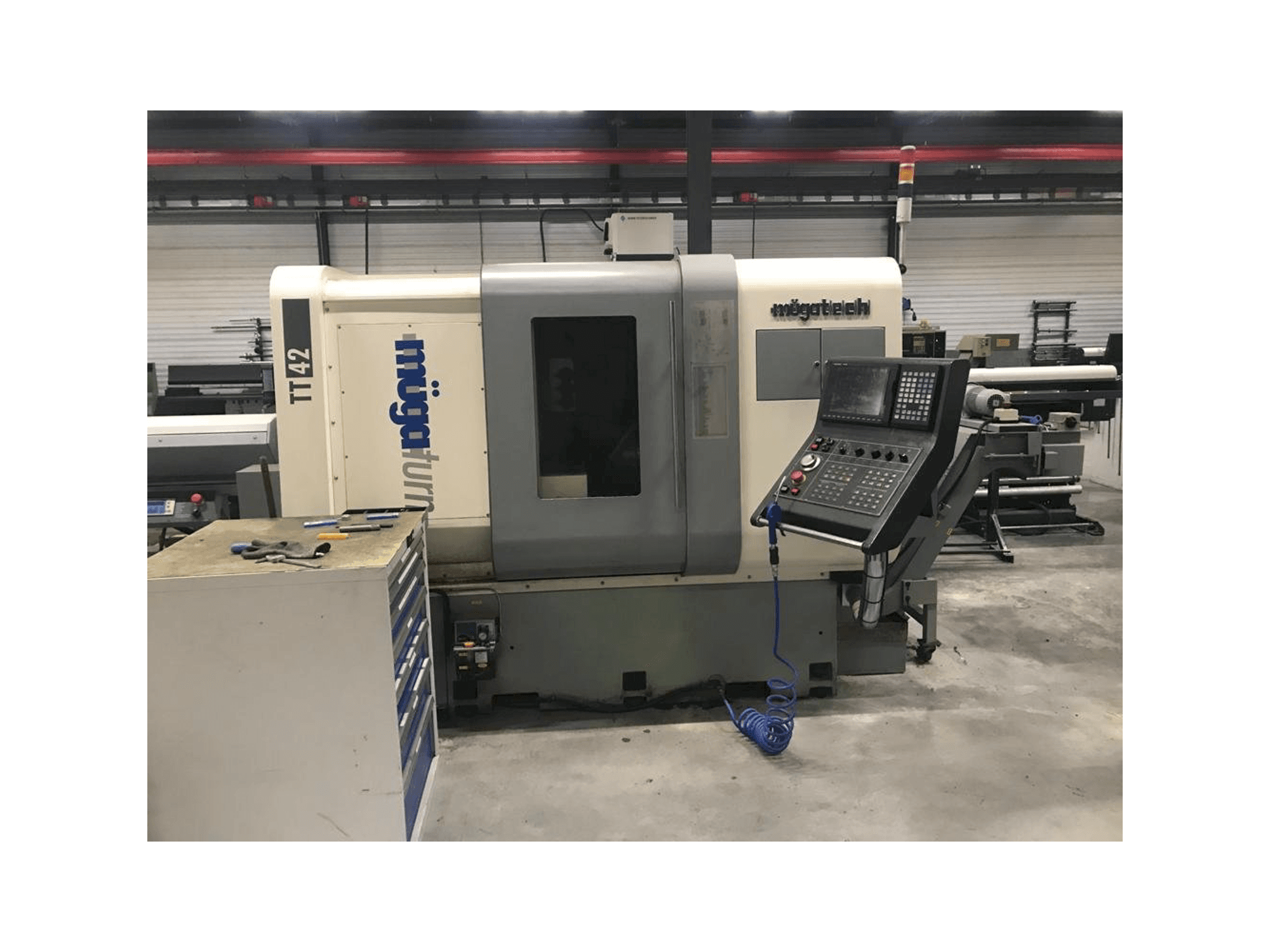 Čelní pohled na Muga TT-42 stroj