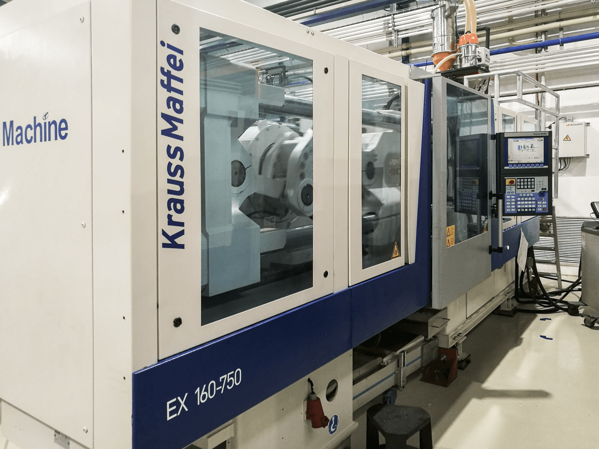Levý pohled na Krauss Maffei 160-750 EX stroj
