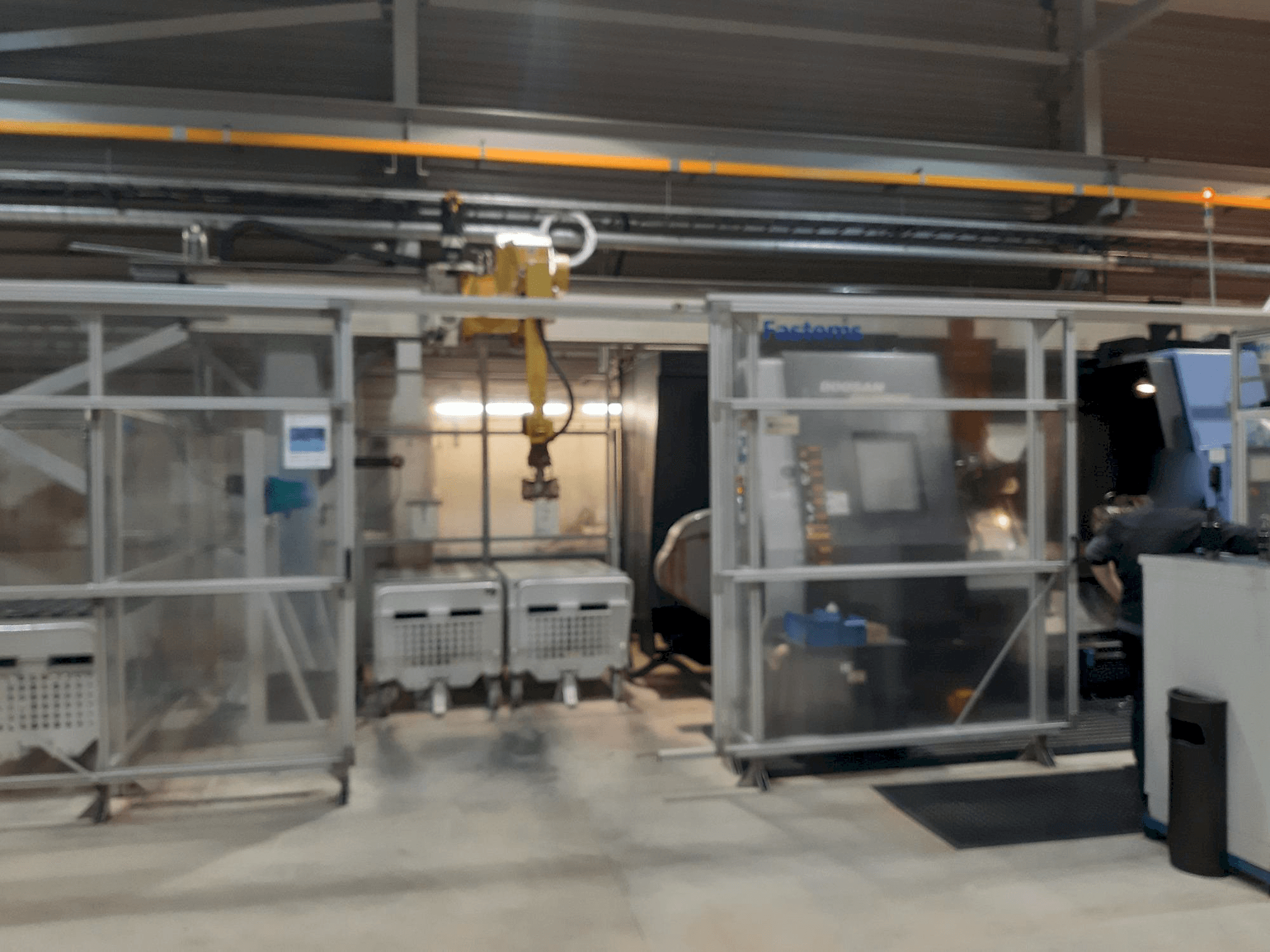 Čelní pohled na Fastems RPC-70 with Fanuc M-710iC stroj